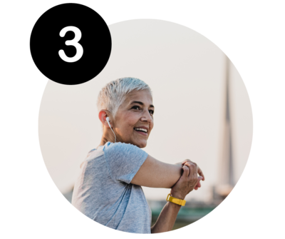 Older woman stretching, smiling and feeling better after chiropractic care with Dr. Sue Pausin at the family care chiropractic centre